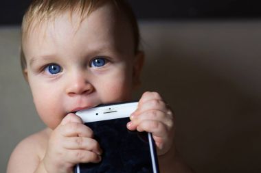 Baby biting smartphone case clipart
