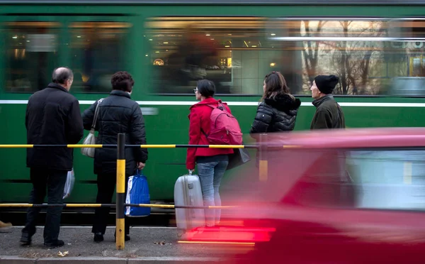 People at a tram stop — Stock Photo, Image