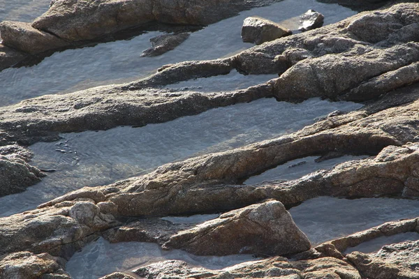 Puddles on rocks — Stock Photo, Image