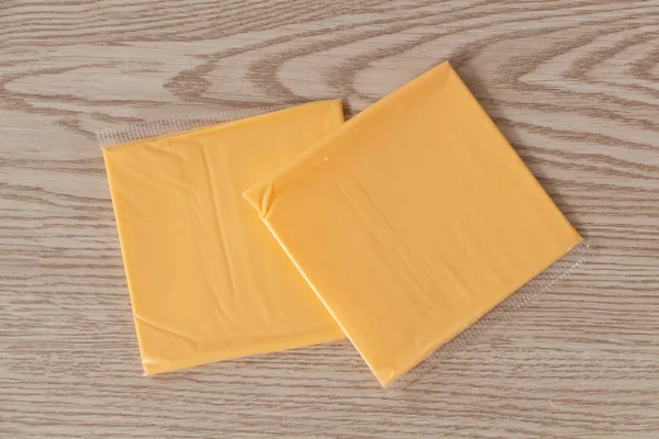 Partes de queijo transformado — Fotografia de Stock