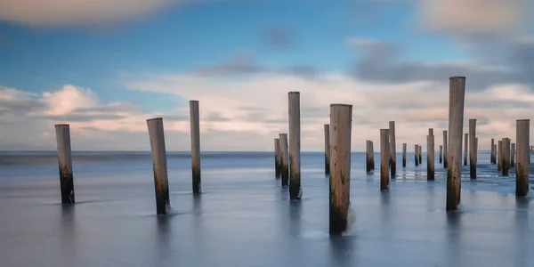 Pólos Praia Petten Holanda Durante Pôr Sol Vento Forte Uma — Fotografia de Stock