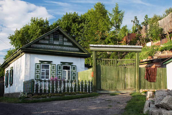 Old house in russian siberian style in the Petropavl, Kazakhstan. 