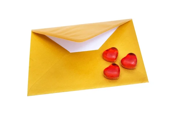 Red hearts and open gold envelope. — Stock Photo, Image