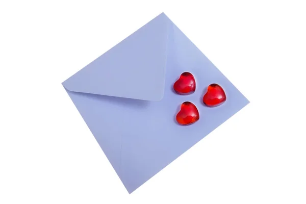 Rode harten en open blauwe envelop. — Stockfoto