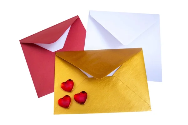 Group of open multicolored envelopes with red hearts. — Stock Photo, Image