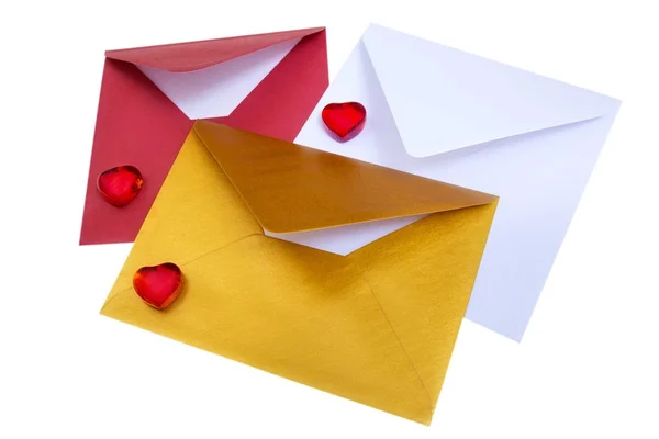Group of open multicolored envelopes with red hearts. — Stock Photo, Image