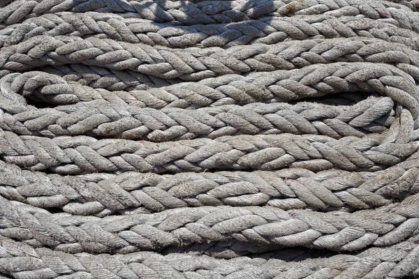 Thick white ropes on a sailing ship. — Stock Photo, Image