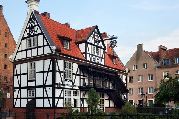 GDANSK, POLAND - JUNE 07, 2014: Half-timbered building known as the House of the Guild of Mills. Was built in 1997 as replica of the former historic house built in 1831, which was destruction.
