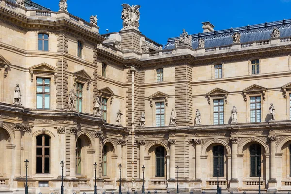 Details of the facade of the Louvre. Is the world largest art museum and is housed in the Louvre Palace Stock Picture