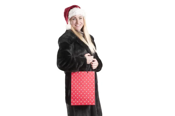 Vrouw Een Bont Jas Cap Santa Claus Boodschappentas Kerstinkopen — Stockfoto