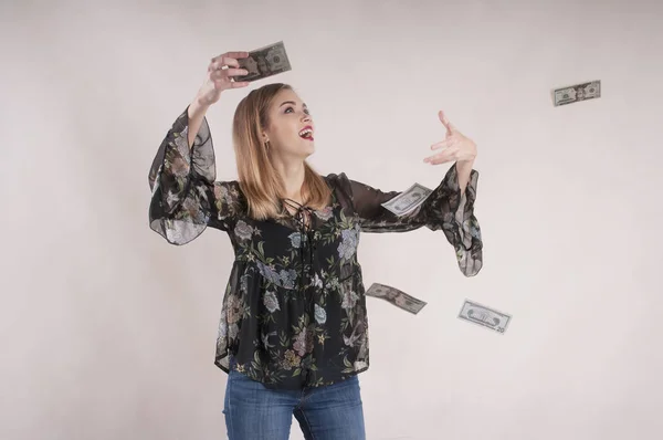 Young Girl Jeans Catches Money — Stock Photo, Image