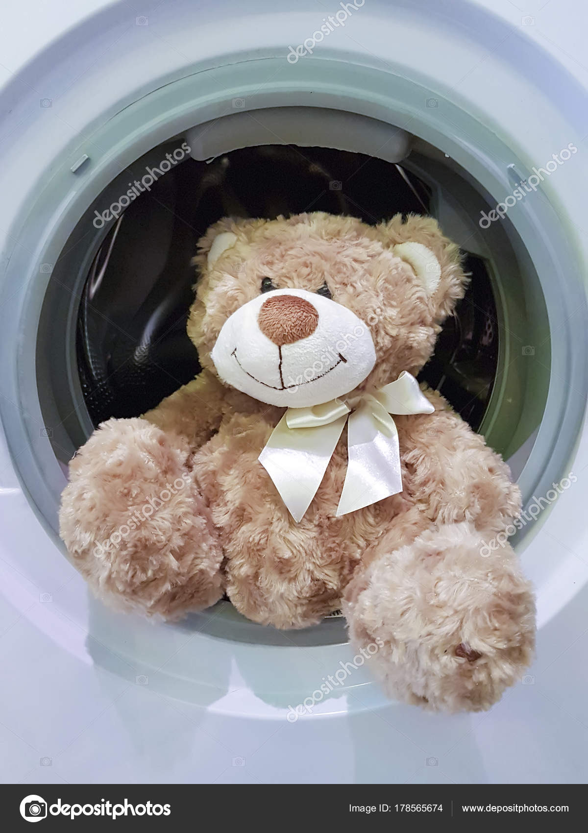 washing teddy bear in washing machine