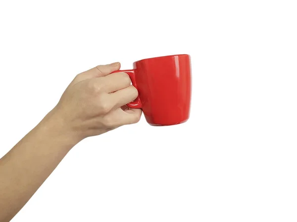 Mano Femenina Con Una Taza Roja Aislada — Foto de Stock