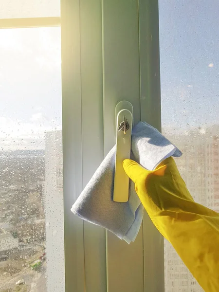 Female Hand Yellow Gloves Cleansing Window Blue Rag Glass — Stock Photo, Image