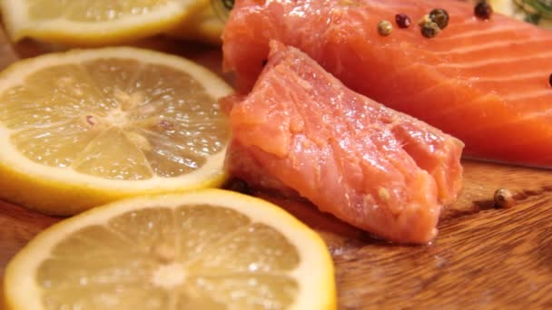 Fresh salmon on a wooden — Stock Footage Fresh Salmon Wooden Stock Footage