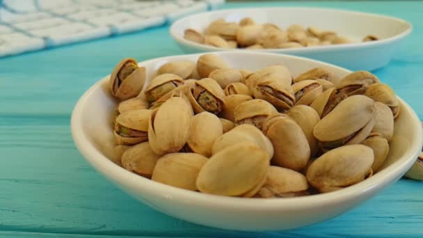 Pistachios Wooden Plate Background — Stock Video