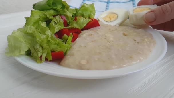 Oatmeal Porridge Plate Salad Egg Hand — Stock Video