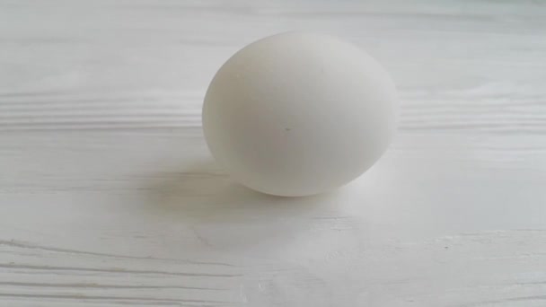 White Egg Spinning Wooden — Stock Video