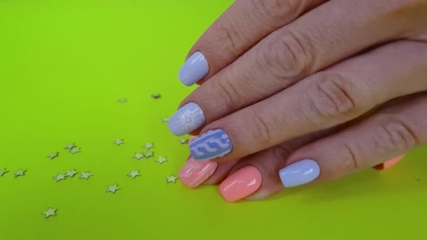 Female Hand Beautiful Manicure Colored Background — Stock Video