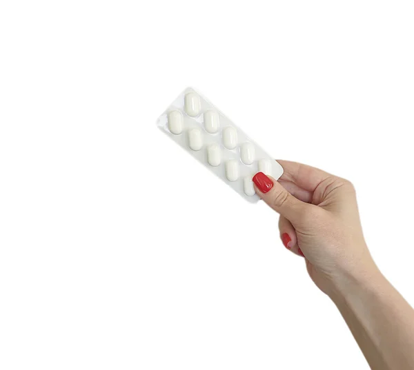 Női Kéz Tart Egy Csomag Tablettát Izolált — Stock Fotó