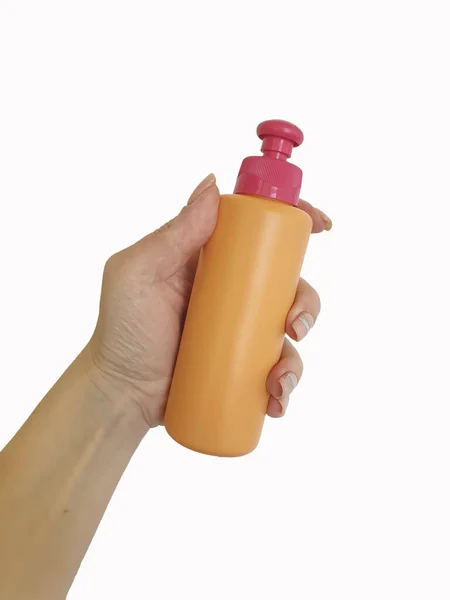 Female Hand Holds Cosmetic Container Isolated — Stock Photo, Image