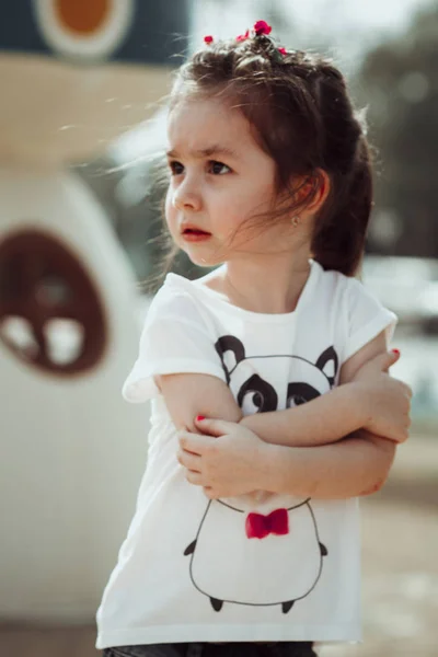 Portrait of sad little girl at the day time outdoor — Stock Photo, Image