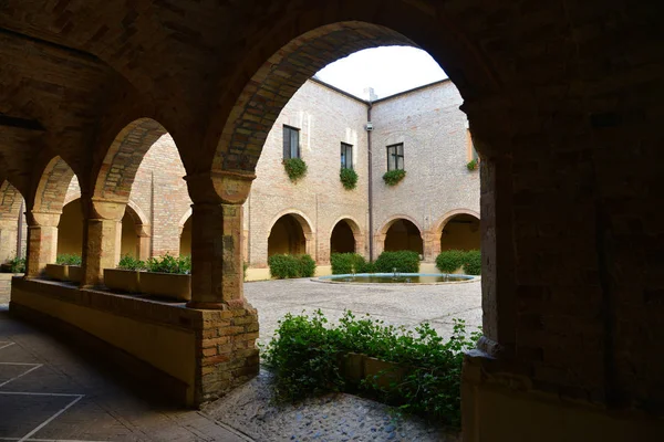 cloister with brick arches