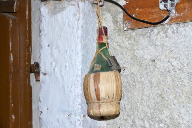 Wicker wine bottle with stopper  