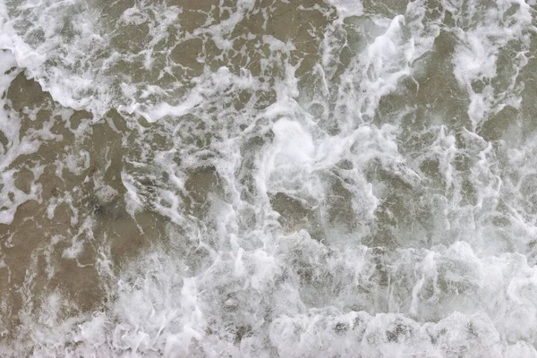 Κορυφαία Προβολή Κύματα Υφή Αφρού Και Πιτσίλισμα Στον Ωκεανό Ηλιόλουστη — Φωτογραφία Αρχείου