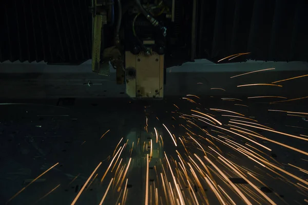 Industrial Laser cutting processing manufacture technology of flat sheet metal steel material with sparks