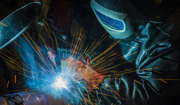 Industrial steel welder in factory technical,