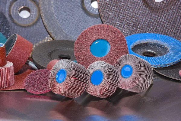 Flap Wheel. A pile of color abrasive sandpaper for metal working — Stock Photo, Image