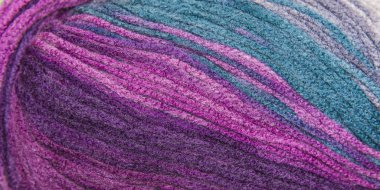 örme için arka plan iş parçacığı. Renkli iplik yün örgü modeli.