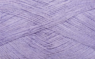 örme için arka plan iş parçacığı. Renkli iplik yün örgü modeli.