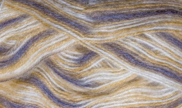 編むことのためバック グラウンド スレッドです。カラフルな糸のウールのニット パターン. — ストック写真