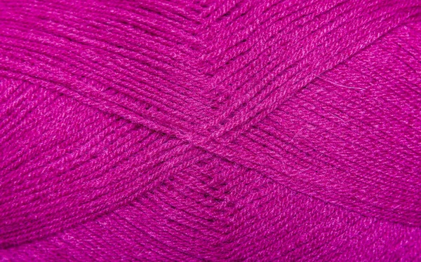 編むことのためバック グラウンド スレッドです。カラフルな糸のウールのニット パターン. — ストック写真