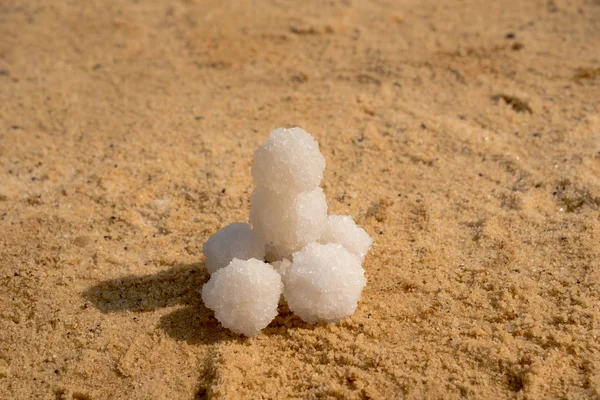 Relax balls of salt on the sand. Sky horizon. Sea. Sand. — Stock Photo, Image
