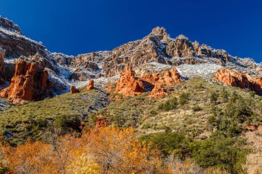 Snow capped hills and brilliant colors of Sedona, Arizona clipart