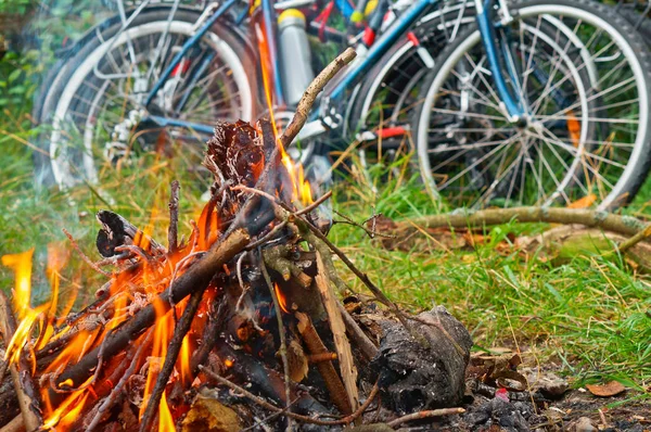 bike trip, cyclists tourists made a fire