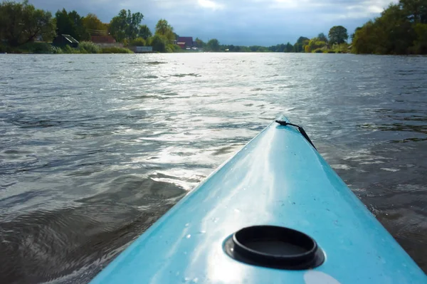 young people rafting on the river, kayaking on a calm river, Matrosovka river, Slavsky district, Kaliningrad region, Russia, September 21, 2019