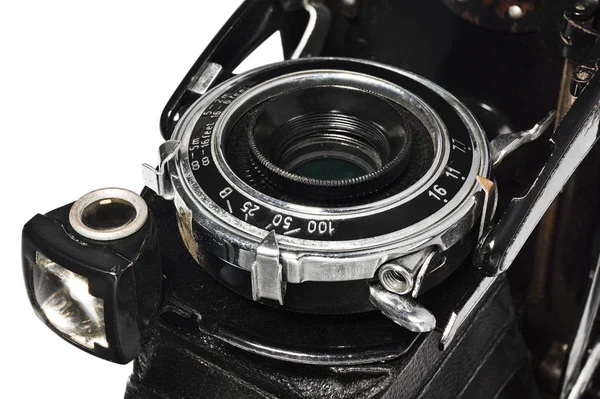 Old, antique, black, pocket camera, close-up of the lens — Stock Photo, Image