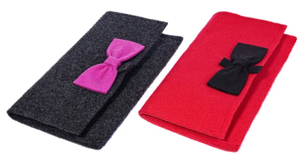 A felt, textile ladies handbags, handmade purses with bows in the color black, pink, red. Textile bags for small items. — Stock Photo, Image