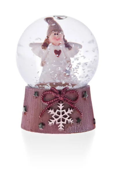 Snow globe with angel on a ceramic base. — Stock Photo, Image