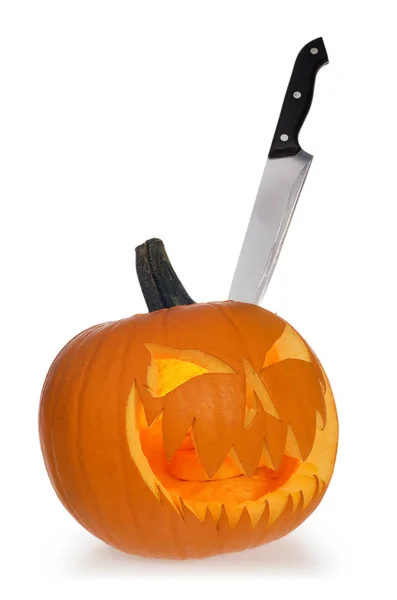 Halloween děsivé dýně světla z uvnitř bodl nožem. — Stock fotografie