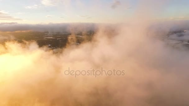 Volcano in the clouds. Flying in the clouds. Kamchatka on the sunset — Stock Video