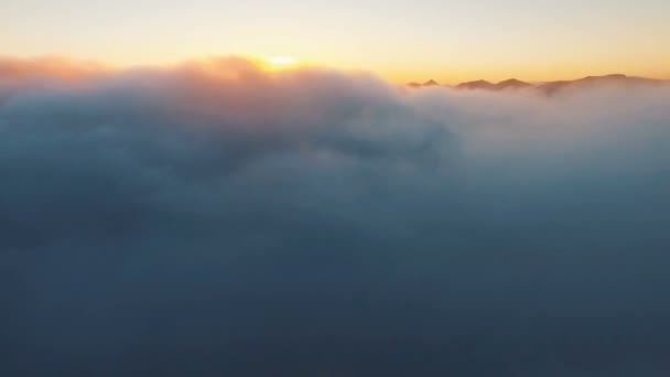 Flying in the clouds. Span in the copter through the clouds. Beautiful nature. Field and mountain — Stock Video