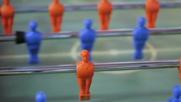 Kick off strike in table football game.The guys play table football. The man is playing football — Stock Video