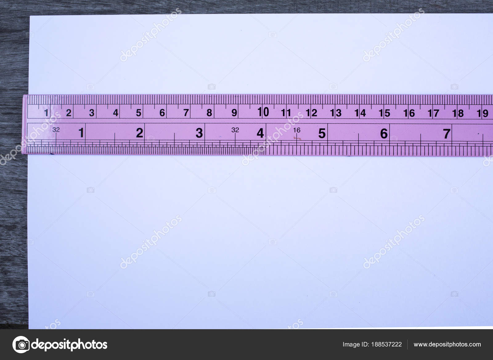 White paper with pink ruler on wood texture background — Stock Photo ...