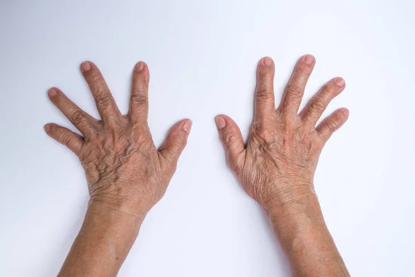 Senior woman hands isolated on white background — Stock Photo, Image