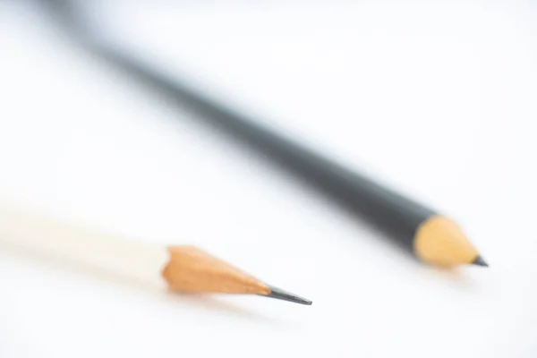 White Pencil Black Pencil White Background Close Macro Shot Selective — Stock fotografie